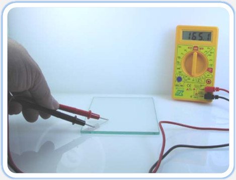 Determine the tin oxide coating side of the glass