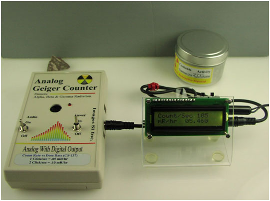 geiger counter, dmad and uranium ore radioactive source
