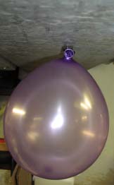 Inflated balloon suspended